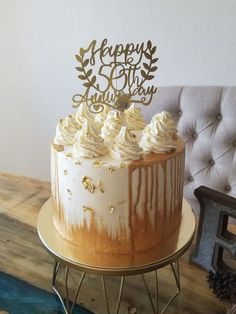 a cake sitting on top of a wooden table