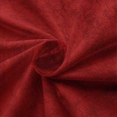 a red fabric textured with some sort of clothing material that is very soft