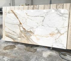 a large marble slab is being worked on