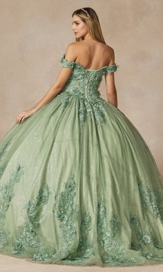 In this glam sage green quinceañera dress, it's easy to feel like a fairytale princess on your 15th birthday. Beautiful 3-D floral appliques on this ball gown quinceañera dress accent the sparkling embroidery that covers the sweetheart bodice, wraps around the dainty off-the-shoulder straps, and trails along the full and fabulous skirt. Glitter fabric gives this embroidered green quince dress a dash of magical shimmer. The lace-up back provides a chic corset design and makes it easy to adjust fo Sage Green Quinceanera Dresses, Sage Green Quinceanera, Green Quince Dress, Long Ball Dresses, Green Quinceanera, Green Quinceanera Dresses, Special Ocassion Dresses, Quinceanera Themes Dresses, Off Shoulder Ball Gown