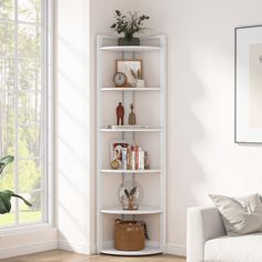 a white corner shelf in the corner of a living room