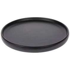 an empty black plate on a white background