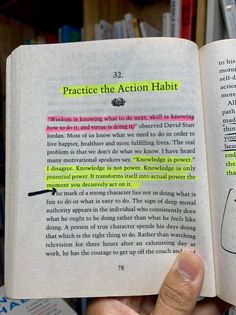 a person is holding an open book in their hand with the words practice the action habit written on it