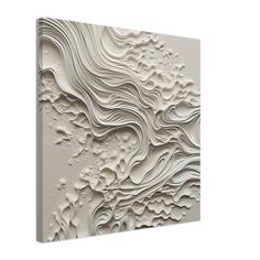 an abstract white wall art piece with wavy lines on the bottom, and waves in the middle