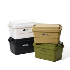 three coolers sitting side by side in different colors and sizes on a white background