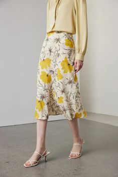 Luxurious Mulberry Silk Floral Skirt: Perfect for Summer Elegance Breathe new life into your spring and summer wardrobe with this vibrant High Waisted A-Line Silk Floral Midi Skirt. Crafted from top-tier 6A Mulberry silk, this piece offers both comfort and sophistication with its cooling, fluid drape. Featuring a double crepe printing technique that enhances the vivid floral patterns, this skirt is as durable as it is stylish. Ideal for a weekend getaway or a romantic evening out, its high-waist Summer Elegance, Silk Midi Skirt, Silk Knit, Romantic Evening, Floral Midi Skirt, Shearling Coat, Weekend Getaway, Classic Silhouette, Floral Patterns