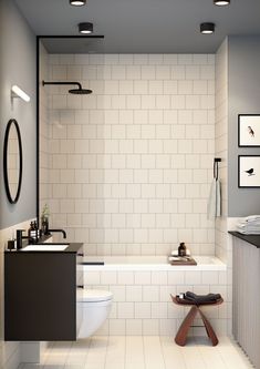 a bathroom with a toilet, sink and bathtub in white tiled walls next to a stand up shower