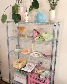 a metal shelving unit with various items on it