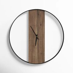 a clock made out of wood and metal