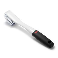 a white and black toothbrush on a white background