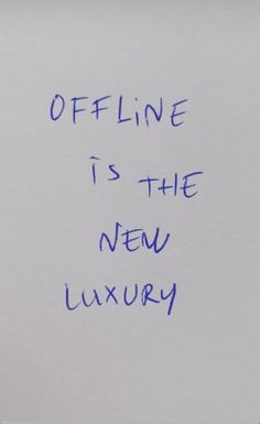 a piece of paper with writing on it that says offline is the new luxury