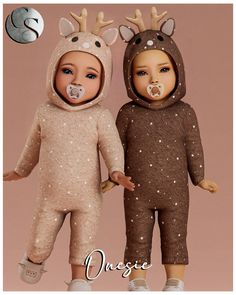 two dolls are dressed in animal onesuits and one is holding the hand of another doll