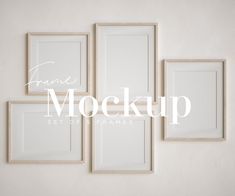 four white frames hanging on the wall with text mockup set of three framed photos