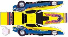 an image of a paper car that is yellow and blue with flames on the side