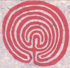 an image of a red and white spiral design on the side of a concrete wall