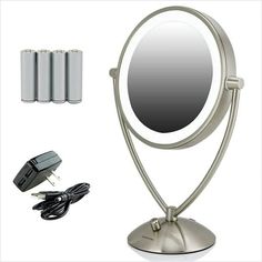 an image of a bathroom mirror with three batteries and charger for the plugs