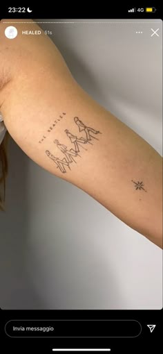 a person with a tattoo on their arm