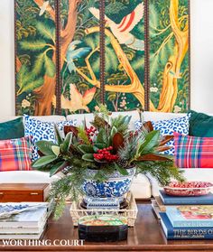 a living room filled with lots of furniture and decor