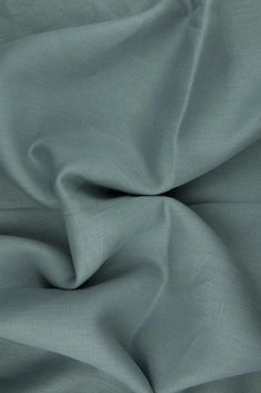 a close up shot of the fabric in blue grey, which is very soft and smooth