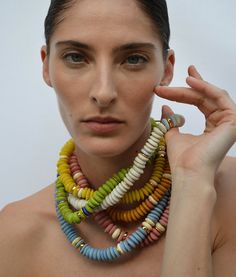 Say hello to the Laguna Necklace, our best-selling, consciously crafted statement piece strung with recycled glass beads. These unique, ethically-sourced Ashanti beads come from Ghana, Africa and are created using the same traditional methods employed by craftspeople for over 1000 years. For every purchase of the Laguna Necklace in Sky Blue, we're donating 15% to the Environmental Defense Fund to support the preservation of our environment and natural resources. Recycled glass beads, gold-plated Modeling Jewelry, Recycled Glass Bead Necklace, Modern Beaded Jewelry, Necklace Ads, African Glass Bead Necklace, Necklace Clay Beads, African Glass Beads, Wrap Necklace, Statement Necklace 2024