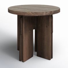 a round wooden table with two legs