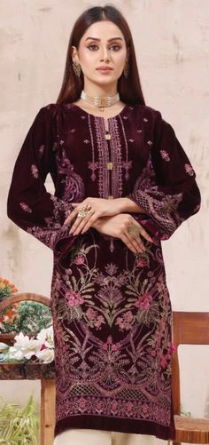 It is a beautiful ready to wear kurta for women. It is available in 2 sizes. Small  Chest 38 inches all around, waist 38, hips 42 and length 39 inches. Large Chest 45 inches all around, waist 44, hips 46 and length 39 inches. This is a beautiful fully embroided kurta with tilla thread embroidery, sequins and tussles on it. It is just a kurta no pants with this . The fabric is velvet which is very soft and lightweight. Color dark purple. No return or exchange please. Velvet Kurtis, Kurta For Women, Pakistani Salwar, Pakistani Salwar Kameez, Designer Kurtis, Designer Kurti, Thread Embroidery, Small Chest, Kurti Designs