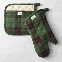 A holiday favorite since Victorian times, Scottish plaid gives our kitchen essentials a regal, classic touch. The oven mitt and potholder are woven of yarn-dyed cotton/linen, and quilted and lined with cotton terry to protect hands from the heat. Each one is equipped with a loop for convenient hanging storage. Set includes oven mitt and potholder. Loops allow convenient hanging storage. Quilted and lined with cotton terry. Features yarn-dyed tartan plaid on twill-woven cotton/linen blend. By choosing our cotton products, you're supporting our investment in Better Cotton's mission. This product is sourced via mass balance and therefore may not contain Better Cotton. Girl Apartment, Cabin Inspiration, Victorian Times, Green Tartan, All Christmas, Scottish Plaid, Bronze Hardware, Oven Mitt, Hanging Storage