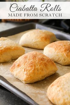 some bread rolls sitting on top of a baking sheet with the words cahabata rolls made from scratch