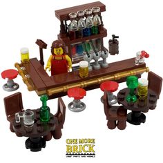 a lego bar with beer glasses and bottles on it