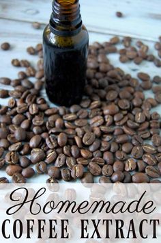 a bottle of coffee next to some coffee beans and the words homemade coffee extract on it