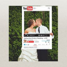 a couple kissing each other in front of a photo frame with the word youtube on it