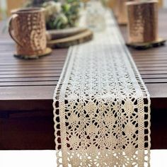 the table is covered with crocheted doily on it's long edge