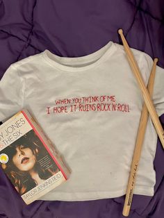 who else is grieving this line from the book not making into the song? well here's your chance to give it justice by wearing it proudly 🎸🤩 this baby tee inspired by the book by TJR is hand embroidered by me and can be made in any size! i can also make it in a tank, regular t shirt, or baseball tee like in pic 7! Music T Shirt, Upcycle Tshirt, Rock N’roll, Rock'n Roll, Aesthetic Words, Baseball Tee, Infant Tees, Rock N Roll, Hand Embroidered