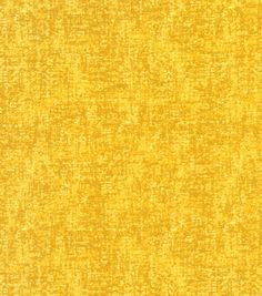 an old yellow textured background that is very similar to the wallpaper in this room