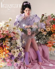 a magazine cover with a woman holding flowers in front of her face and wearing tights