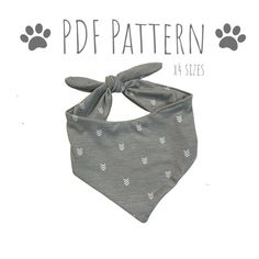 a dog bandana with paw prints on it and the words pdf pattern in white