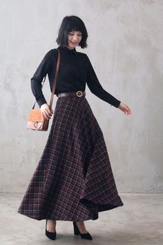 Elevate your style with our 40s Wool Maxi Plaid Skirt. Constructed with high-quality wool, this skirt offers maximum comfort and durability. Its classic plaid pattern adds a touch of sophistication to any outfit. Perfect for any occasion, this skirt is a must-have for any fashion-forward woman. DETAIL * 30% wool, 30% fiber, 40% polyester* fully satiny liner* Two side pockets* Right zip closure* Pleated Circle skirt* Knee length skirt* Perfect for Winter, autumn* Lean More about the items From the FAQs on the page bottom SIZE GUIDESize vary between Brand and CountryPlease get your body measurement with our Size GuideAnd Find your size in our Size Chart Choose CUSTOM Order if youCan't find your size in our size ChartChange the LengthChange the sleeve LengthYour Height is not Between 5'1" - 5 Wool Circle Skirt, Patterned Maxi Skirt, Plaid Maxi Skirt Outfit, Plaid Pleated Skirt Outfit, Knee Length Skirt Outfit, Knee Length Skirts Outfits, Ghost Shoot, Sew Maxi Skirts, Tartan Skirt Outfit