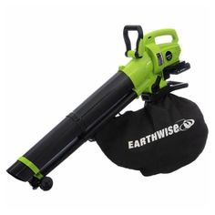 a green and black blow dryer sitting on top of a bag with the word earthwise printed on it