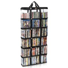 a large black bag filled with lots of dvd's and movies on top of each other