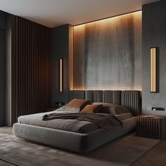 a large bed sitting in the middle of a bedroom next to a wall mounted light