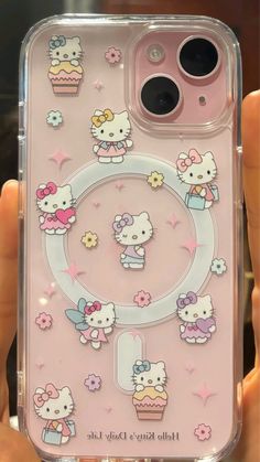 hello kitty phone case with cupcakes and flowers on the front, in pink