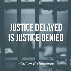 a jail cell with the words justice delivered is justice defined