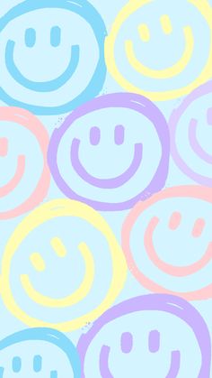 many different colored smiley faces on a light blue and pink background with the words happy written below them