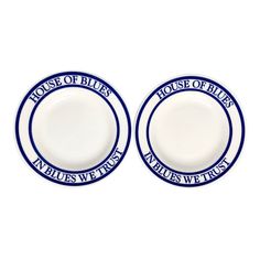 two blue and white plates with the words house of blues written on each one plate