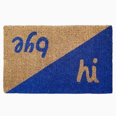 a blue and tan door mat with the words ahp on it