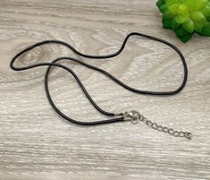 Thick Black Wax Cord Necklace with Stainless Steel Lobster Clasp, Single Necklace Supply, Cotton String Necklace, DIY Jewelry Supplies Listing is for: * ONE Black Waxed Cord Necklace (as pictured);  * Made from high-quality waxed cotton with stainless steel chain extender and lobster clasp.  *SIZE: 23" + 2"; NOTE: Chain length cannot be customized at this time. PERFECT FOR PENDANTS, ZIPPER PULLS, BOOKMARKS, KEYCHAINS & MORE! *Note: As our charm contain small parts, all items are for adult jewelr String Necklace Diy, Wax Cord Necklace, Single Necklace, String Necklace, Necklace Diy, Cotton String, Chain Extenders, Alberta Canada, Zipper Pulls