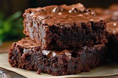 chocolate brownies stacked on top of each other