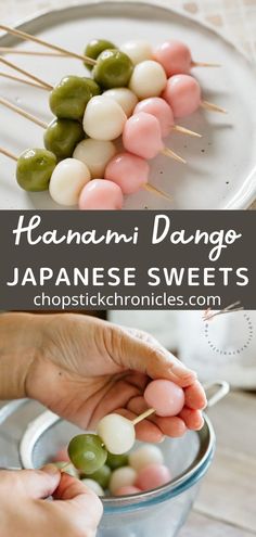 hands picking up small skewers from a bowl filled with green and white candy