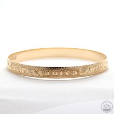 Hawaiian bangle bracelet Traditional Gold Jewelry With Engraving Option, Classic Etched Gold Bracelet For Formal Occasions, Classic Etched Gold Bracelet, Etched Yellow Gold Bracelet For Anniversary, Classic Engraved Jewelry For Promise, Classic Etched Yellow Gold Bracelet, Classic 14k Gold Hallmarked Cuff Bracelet, Yellow Gold Nameplate Bracelet With Engraving Option, Classic Etched Bangle Bracelets