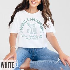 This fun and festive bachelorette shirt is perfect for a celebration of "Margs & Matrimony"! Featuring a stylish margarita glass and tequila bottle graphic, it's designed to highlight the bride-to-be's final fling before the ring. Personalize it with the location and date of the bachelorette party for a unique touch. Whether you're heading to Cancun or another tropical destination, this shirt is a must-have for an unforgettable getaway with your girls. Available in a soft, comfortable fit, it's perfect for all-day wear while making lasting memories. Personalization:  All text on the design can be customized. Input your requests in the personalization box. A proof will be sent within 24 hours of ordering for approval prior to printing.  Shirt Details: Unisex crewneck shirt with a relaxed fi Tequila Bottle, Bachelorette Shirt, Printing Shirt, Bach Party, Bachelorette Shirts, Bachelorette Party Shirts, Comfort Colors Tee, Girls Party, Crew Neck Shirt